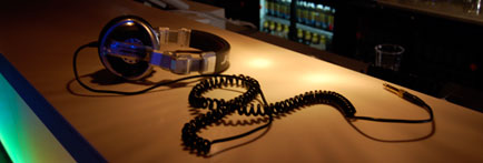 Headphones lying on a bar counter